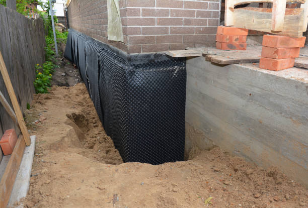 SJ Waterproofing Pros technician performing targeted Waterproofing assessment in Marysville, OH